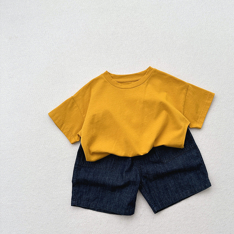 Unisex dark blue denim shorts for kids, made from soft cotton denim, perfect for summer wear.