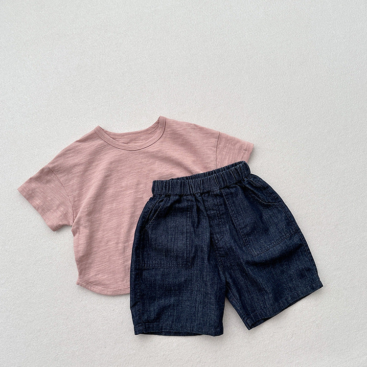 Unisex dark blue denim shorts for kids, made from soft cotton denim, perfect for summer wear.