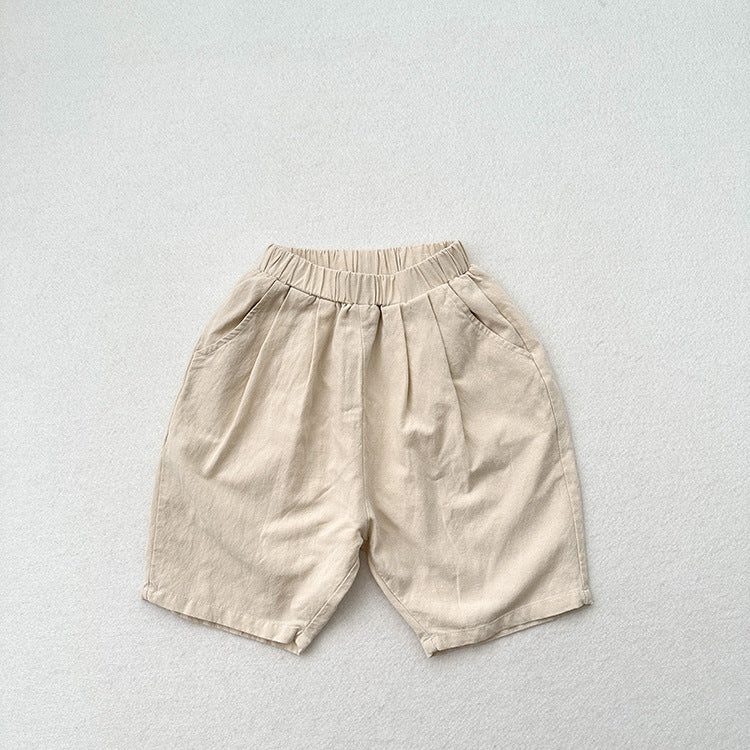 Summer New Arrival Unisex Plain Solid Color Cotton Pants in White, Yellow, and Coffee colors, showcasing their soft fabric and versatile design.