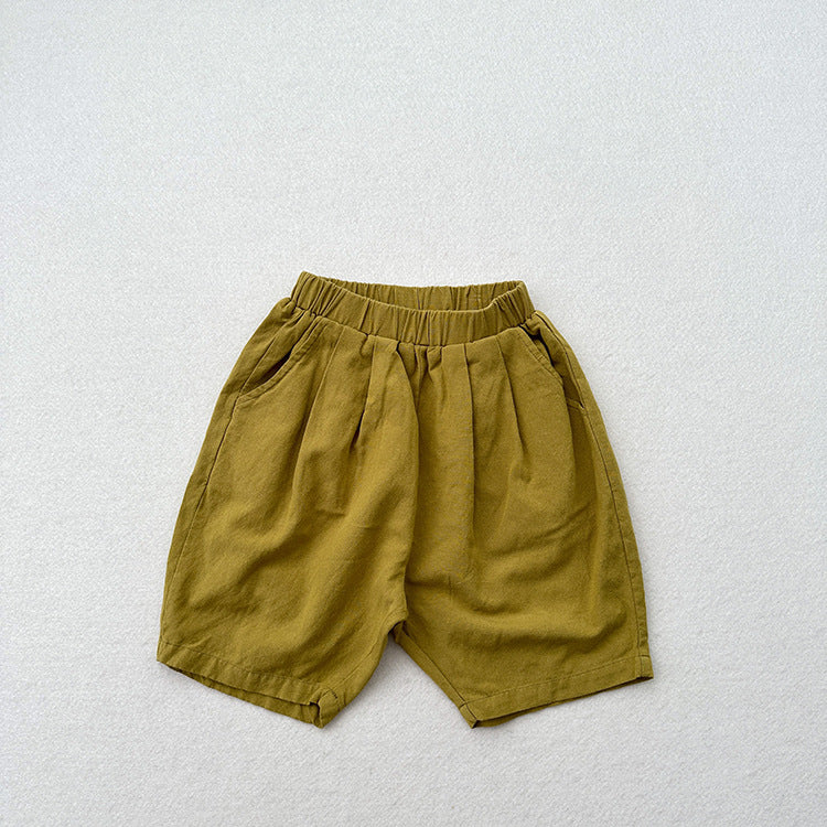 Summer New Arrival Unisex Plain Solid Color Cotton Pants in White, Yellow, and Coffee colors, showcasing their soft fabric and versatile design.