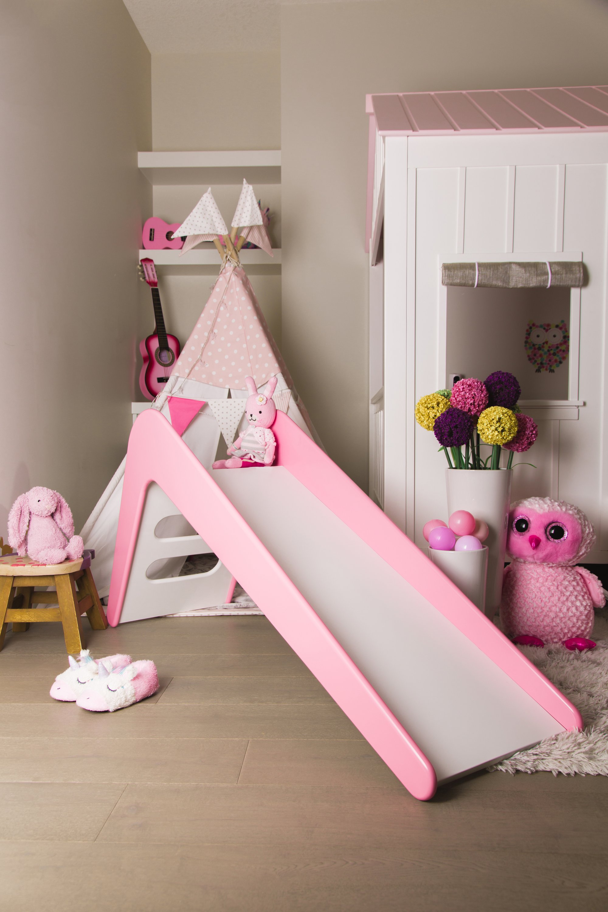 Timeless Pink Wooden Indoor Slide designed for children, featuring a sleek and modern design with child-friendly steps for safe climbing.