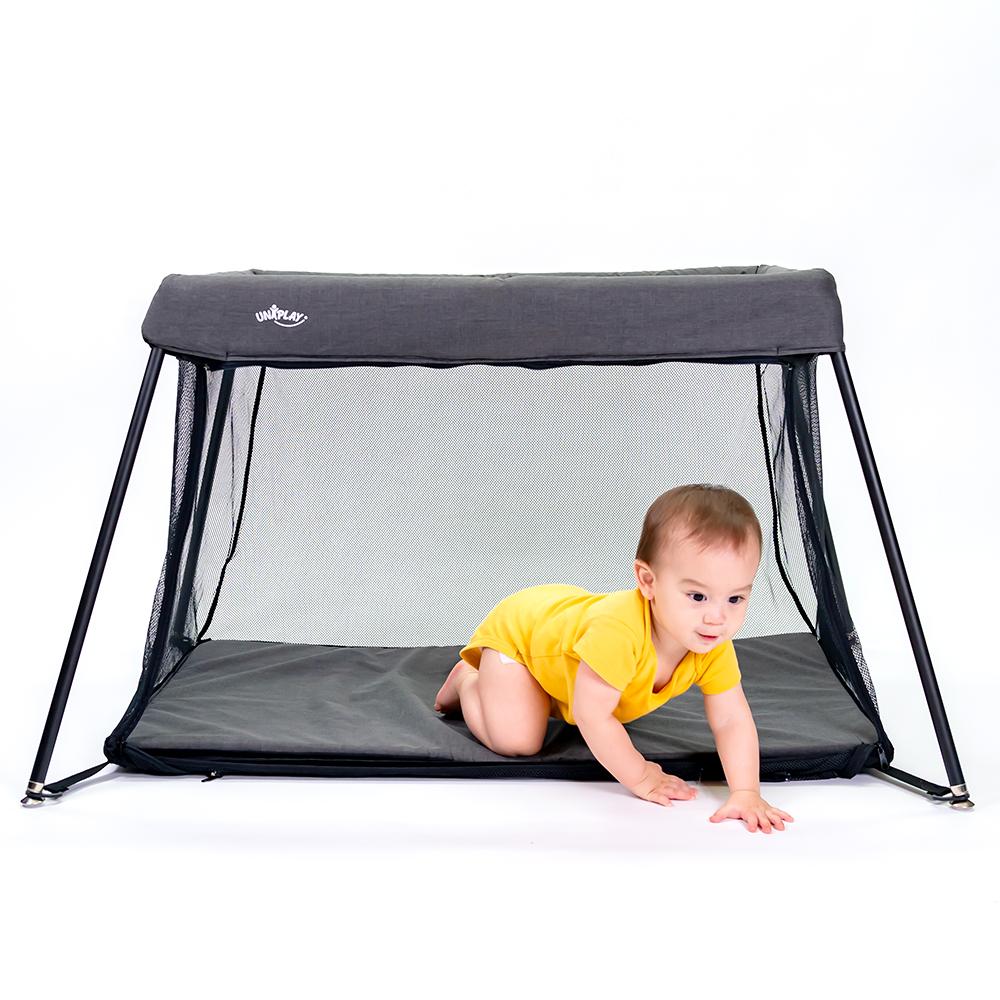 UNiPLAY Portable Playard showcasing its lightweight design and sturdy frame, perfect for travel and easy assembly.