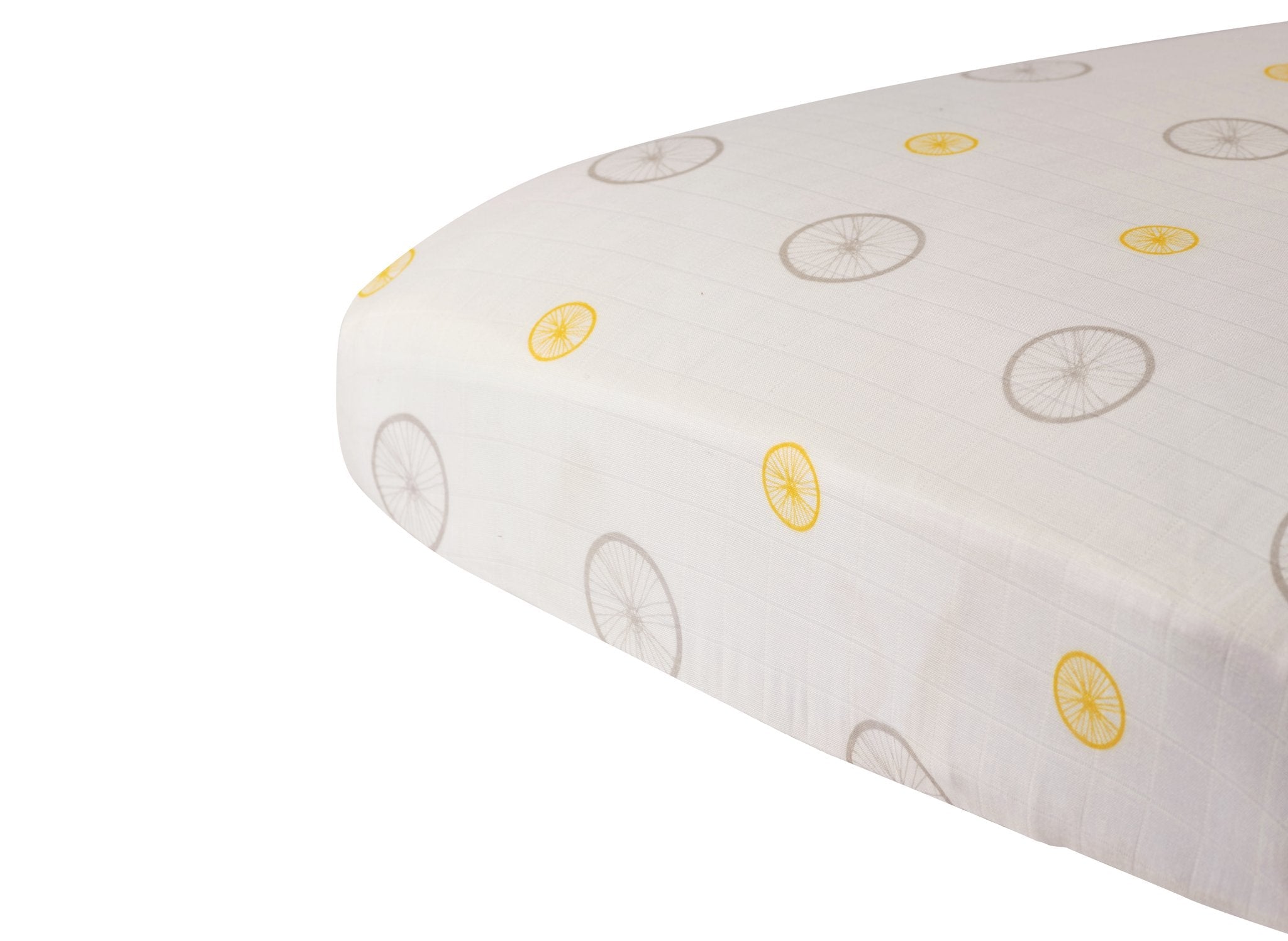 Vintage Wheel Bamboo Muslin Crib Sheet featuring soft, breathable fabric with a charming design, perfect for baby cribs.