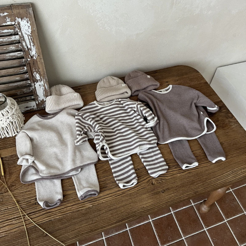 Waffle knitted fabric loose comfy sets in grey, brown, and coffee colors for babies and kids, showcasing soft cotton material and stylish patterns.