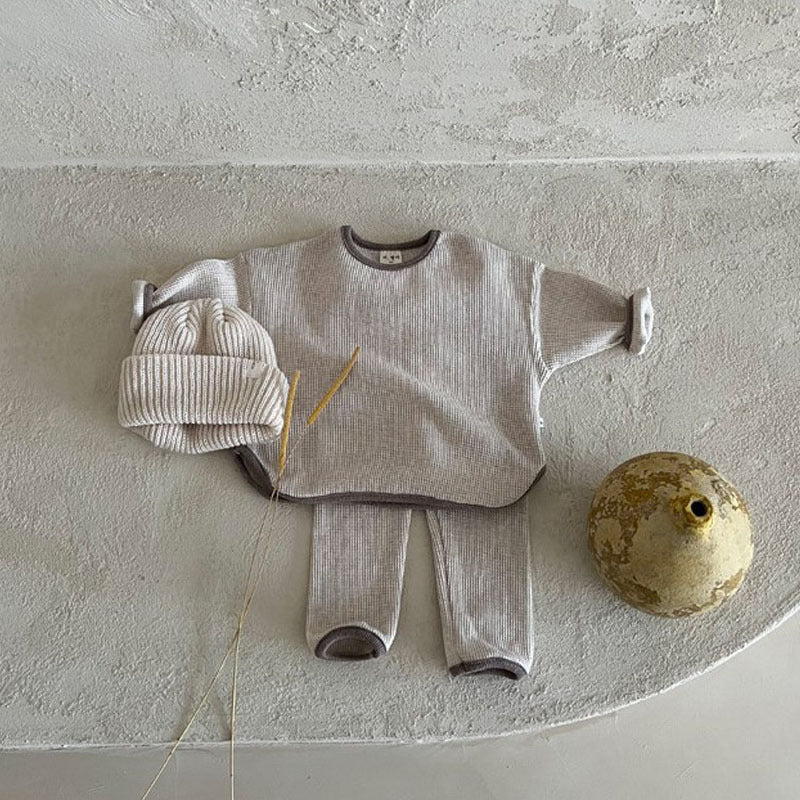 Waffle knitted fabric loose comfy sets in grey, brown, and coffee colors for babies and kids, showcasing soft cotton material and stylish patterns.