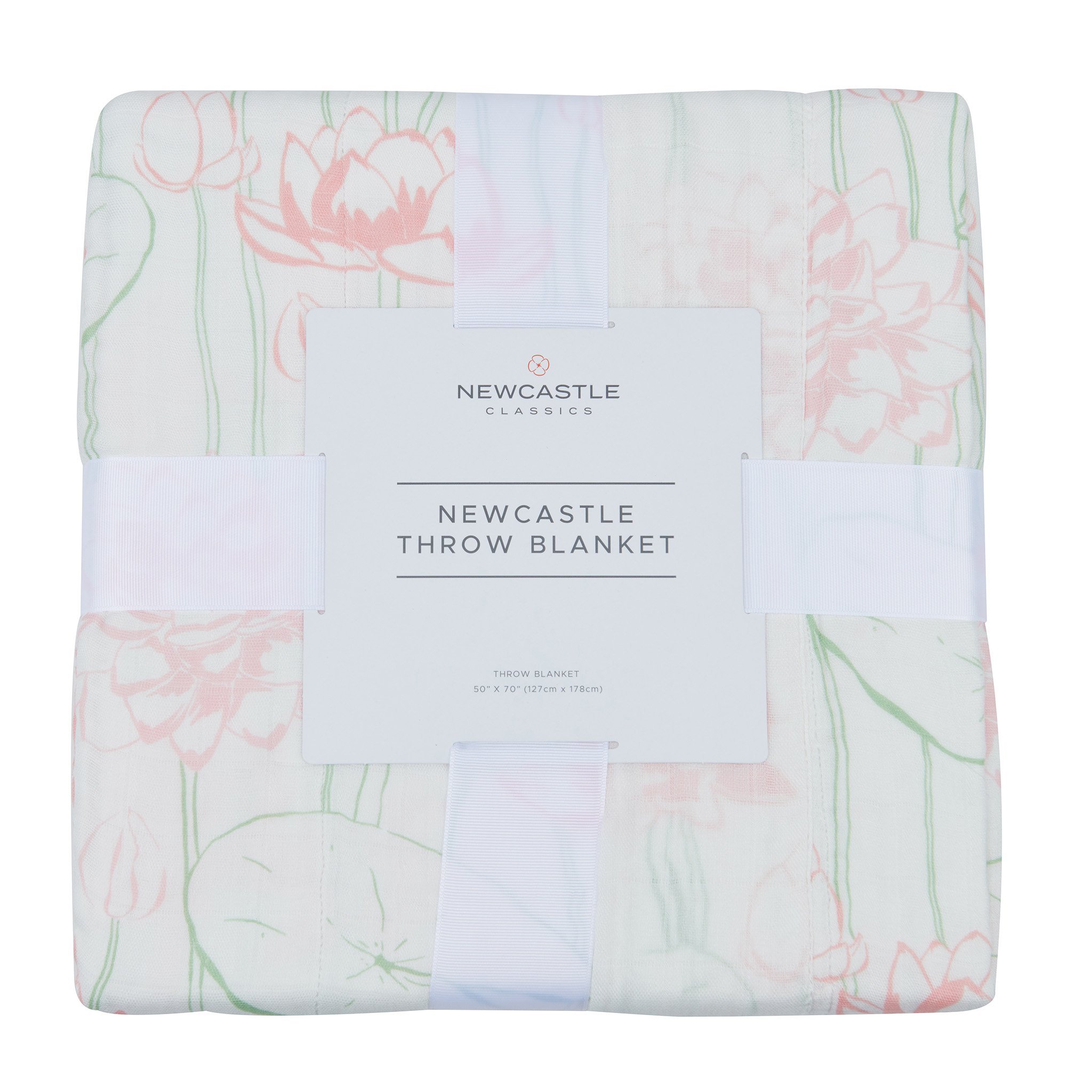 A soft Water Lily Bamboo Throw Blanket in a cozy setting, showcasing its natural bamboo fabric and elegant design.