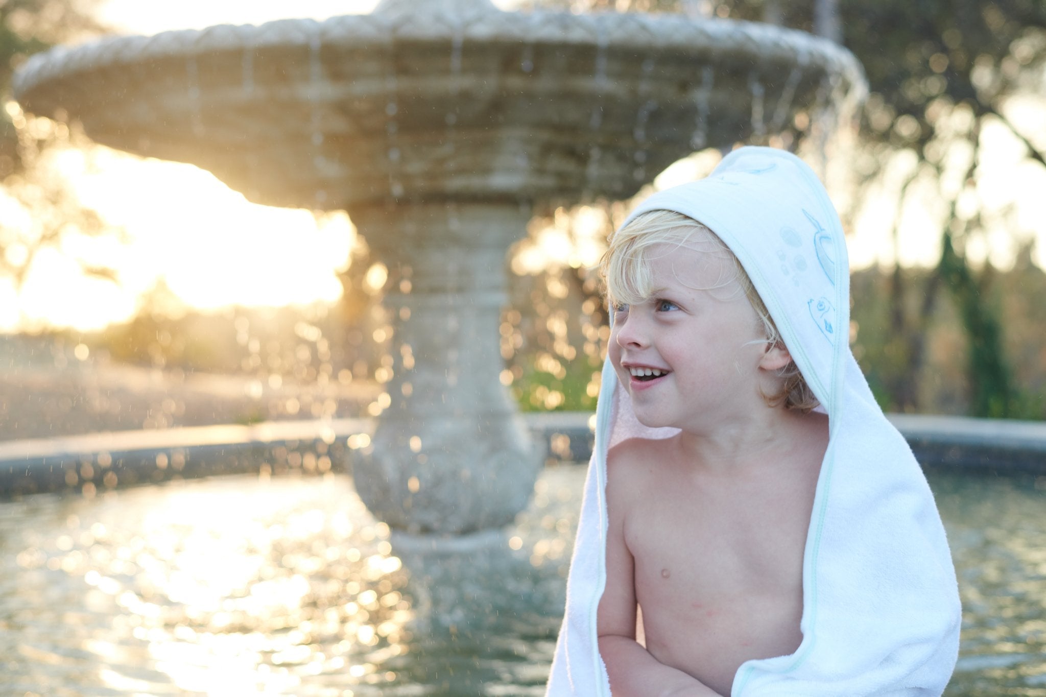 Whale Hooded Towel and Washcloth Set featuring a cute whale design, made from soft cotton terry, perfect for keeping babies warm and dry.