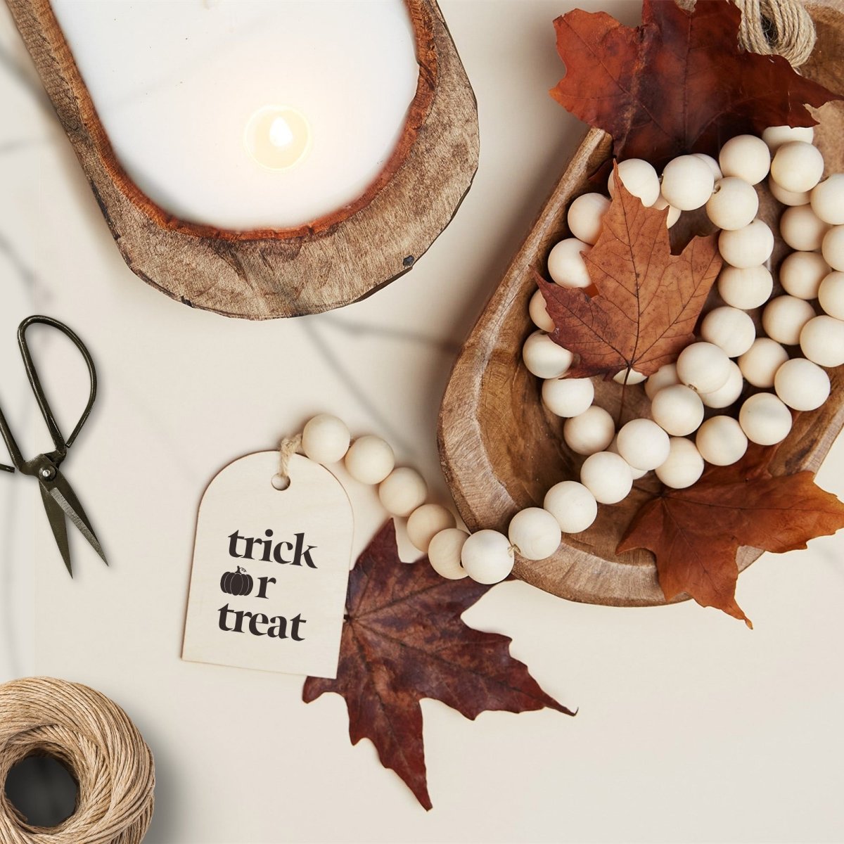 Wood Bead Garland featuring a wooden charm and jute tassel, showcasing natural beads and rustic charm.