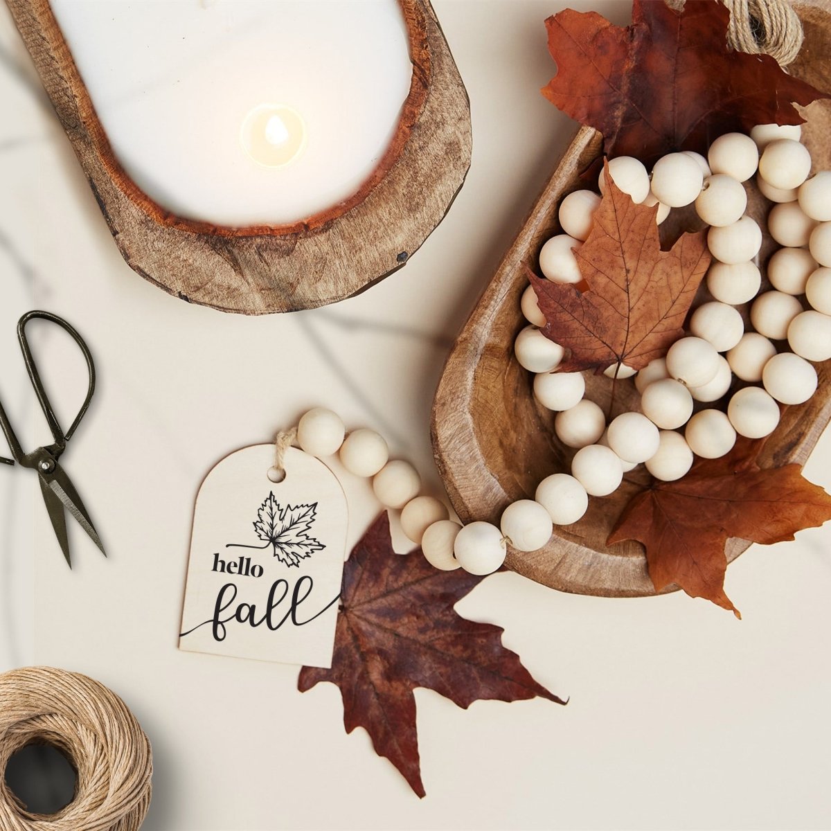 Wood Bead Garland featuring a wooden charm and jute tassel, showcasing natural beads and rustic charm.