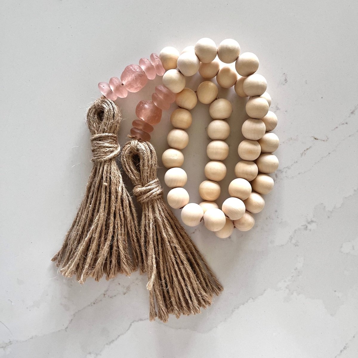 Handmade Wood Bead and Rose Recycled Glass Beads Garland with jute tassels, perfect for coastal decor.