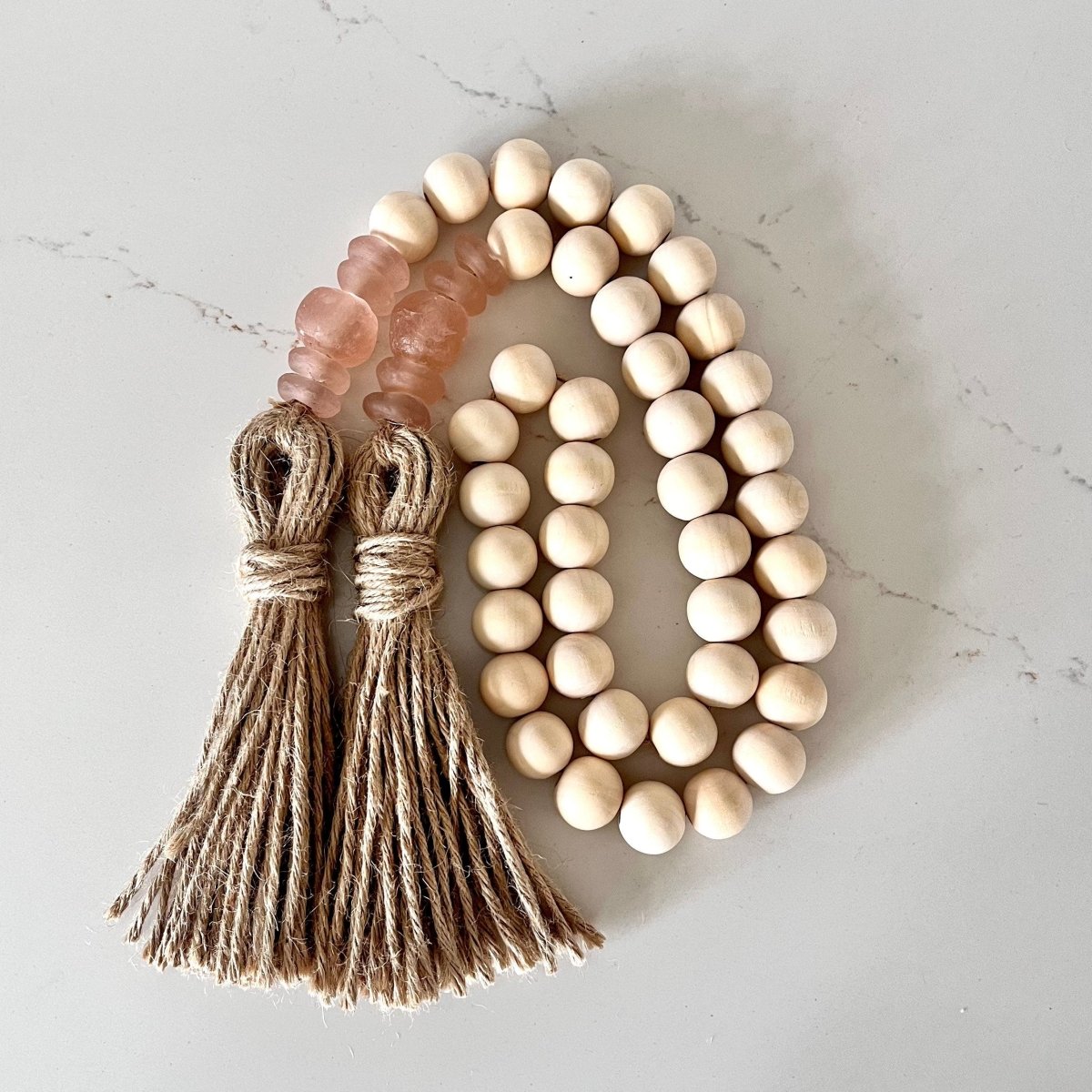 Handmade Wood Bead and Rose Recycled Glass Beads Garland with jute tassels, perfect for coastal decor.