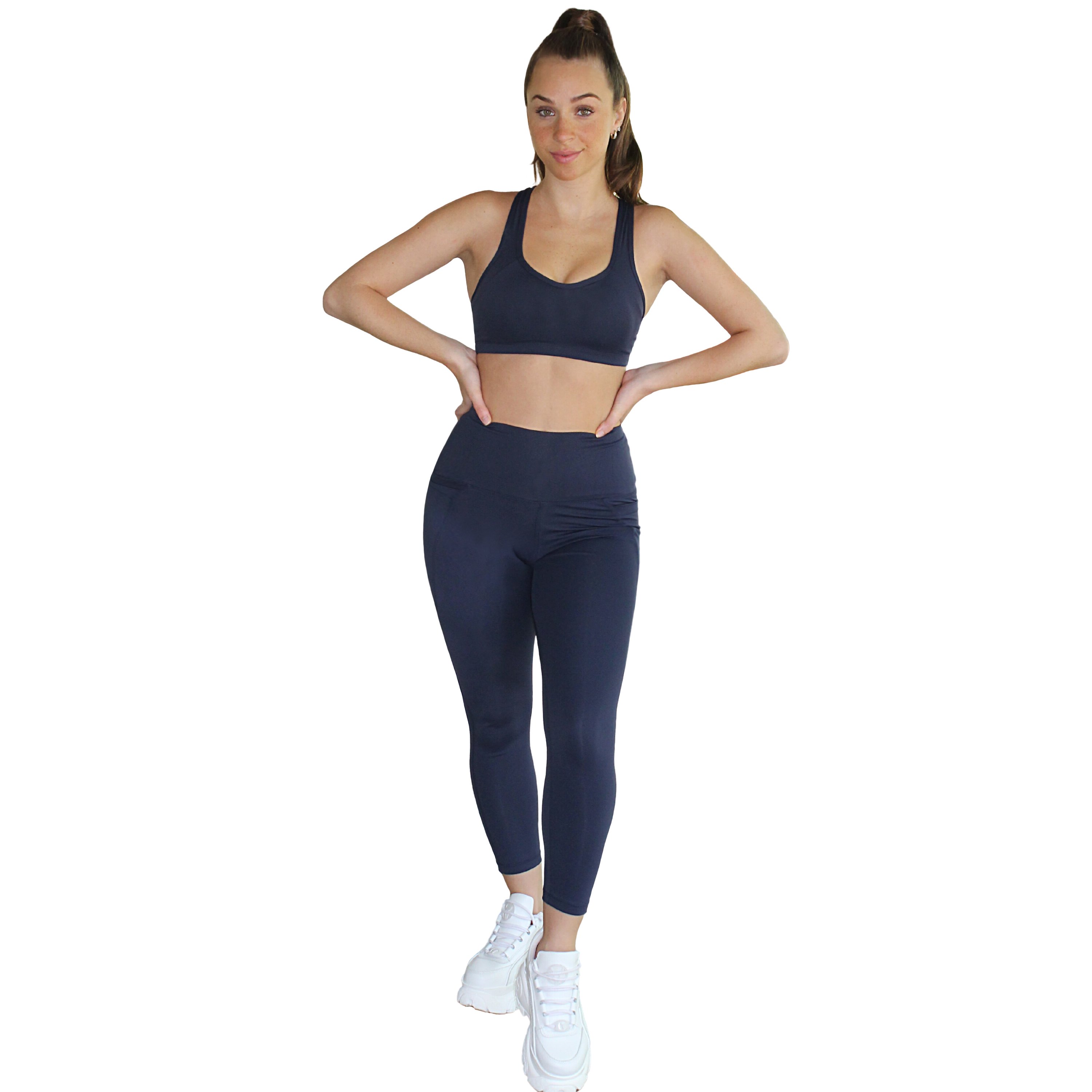 Ananda Racerback Sports Bra in Navy, featuring a double-lined design and removable cups, ideal for yoga and fitness.