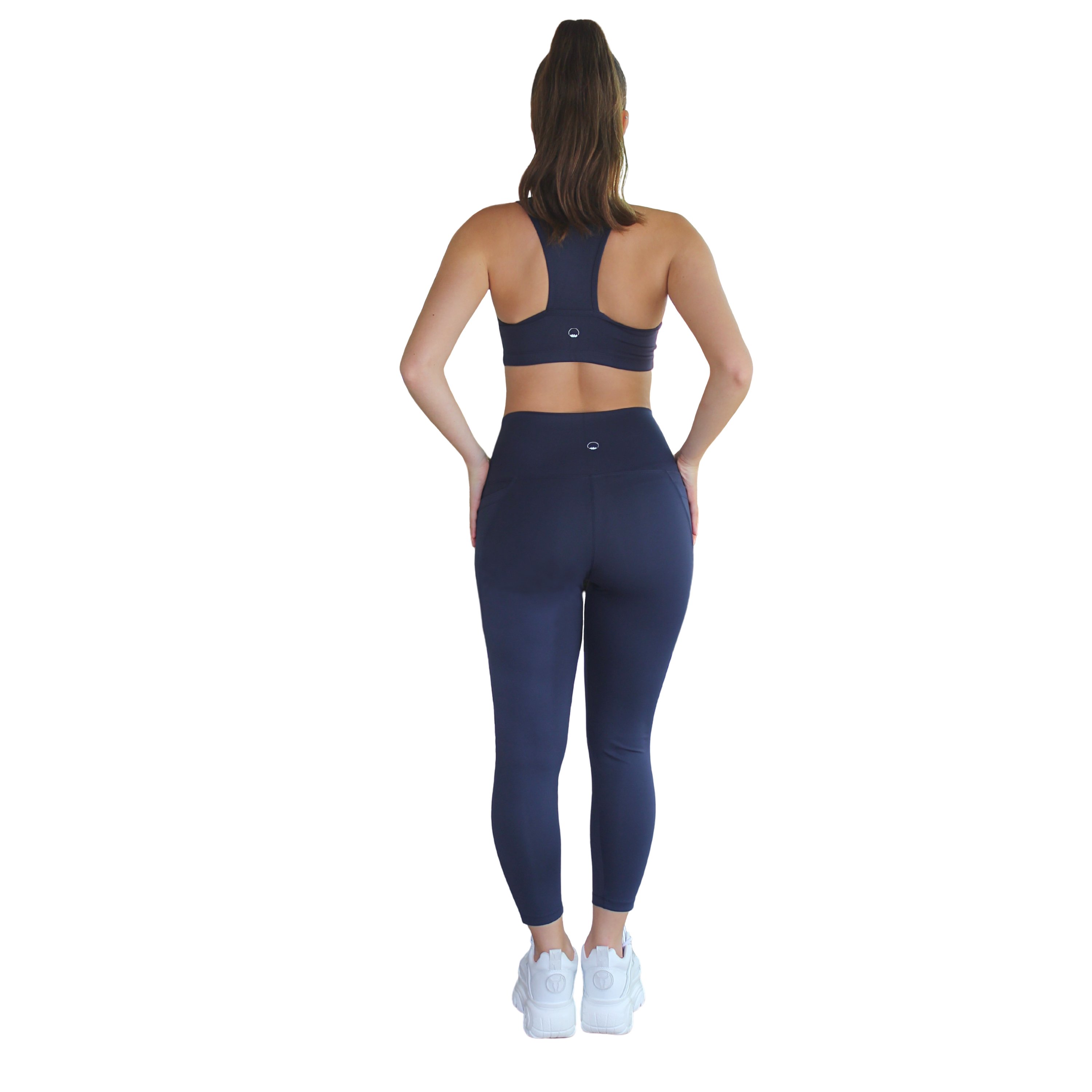 Ananda Racerback Sports Bra in Navy, featuring a double-lined design and removable cups, ideal for yoga and fitness.