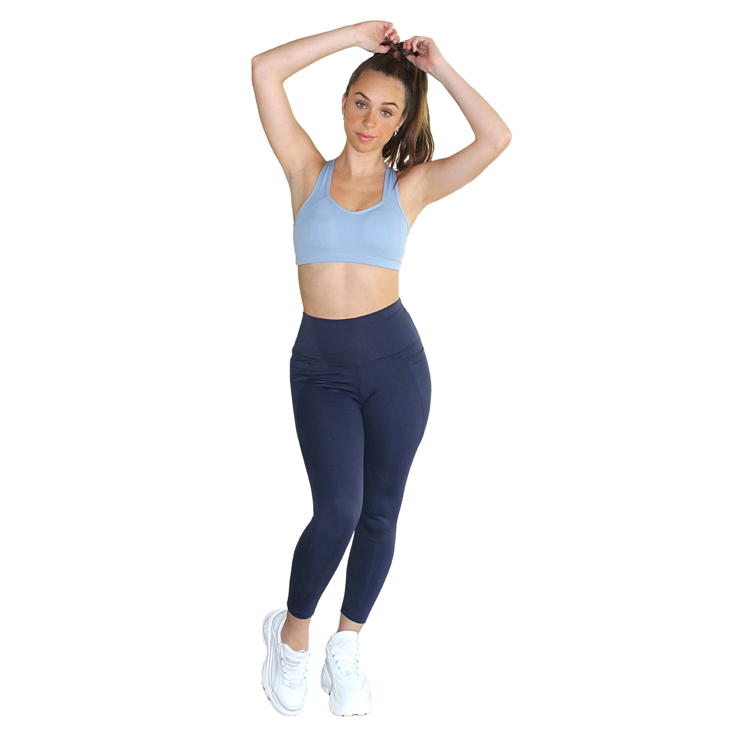 Ananda Racerback Sports Bra in Powder Blue, featuring a double-lined design and racerback style, ideal for yoga and fitness.