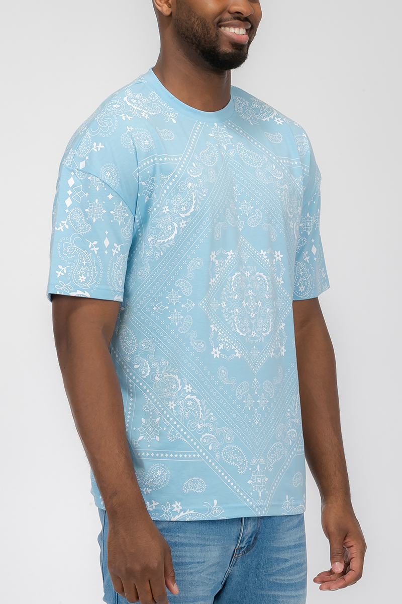 A stylish bandana print t-shirt made from 100% cotton, featuring a relaxed fit and vibrant design, perfect for casual wear.