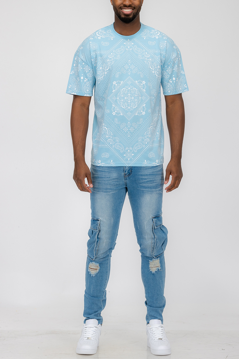 A stylish bandana print t-shirt made from 100% cotton, featuring a relaxed fit and vibrant design, perfect for casual wear.