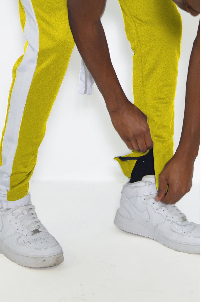 Classic Slim Fit Track Pants featuring a single stripe detail and hidden ankle zipper, perfect for workouts and casual wear.