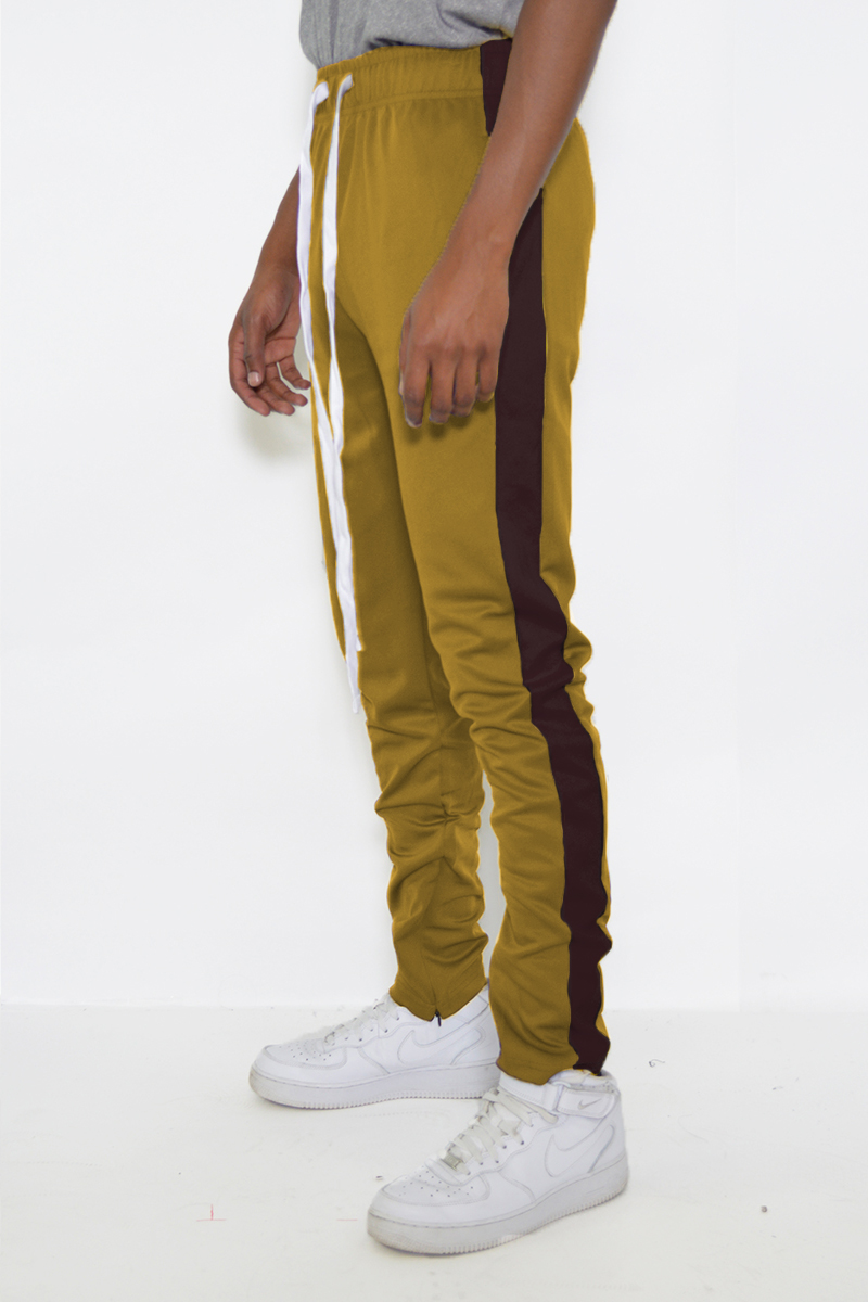 Classic Slim Fit Track Pants featuring a sleek design with a single stripe detail and hidden ankle zippers, perfect for workouts and casual wear.