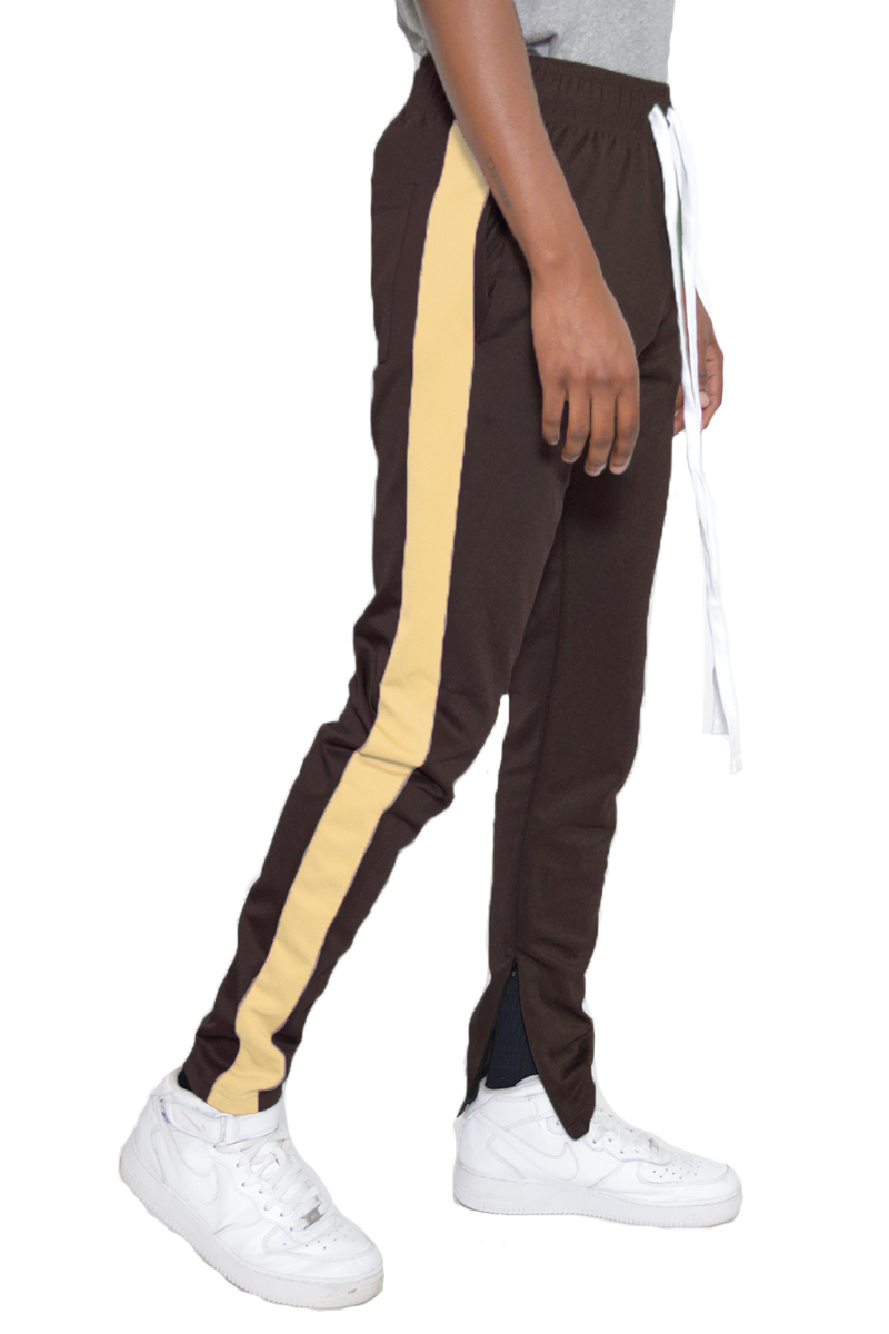 Classic Slim Fit Track Pants featuring a sleek design with a single stripe detail and hidden ankle zipper.