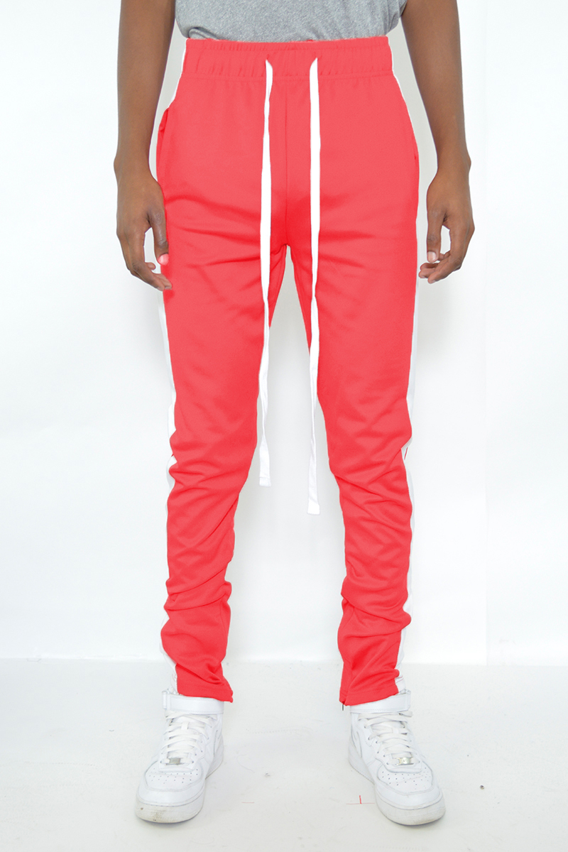 Classic Slim Fit Track Pants featuring a sleek design with a single stripe detail and hidden ankle zippers, made from a durable polyester and spandex blend.