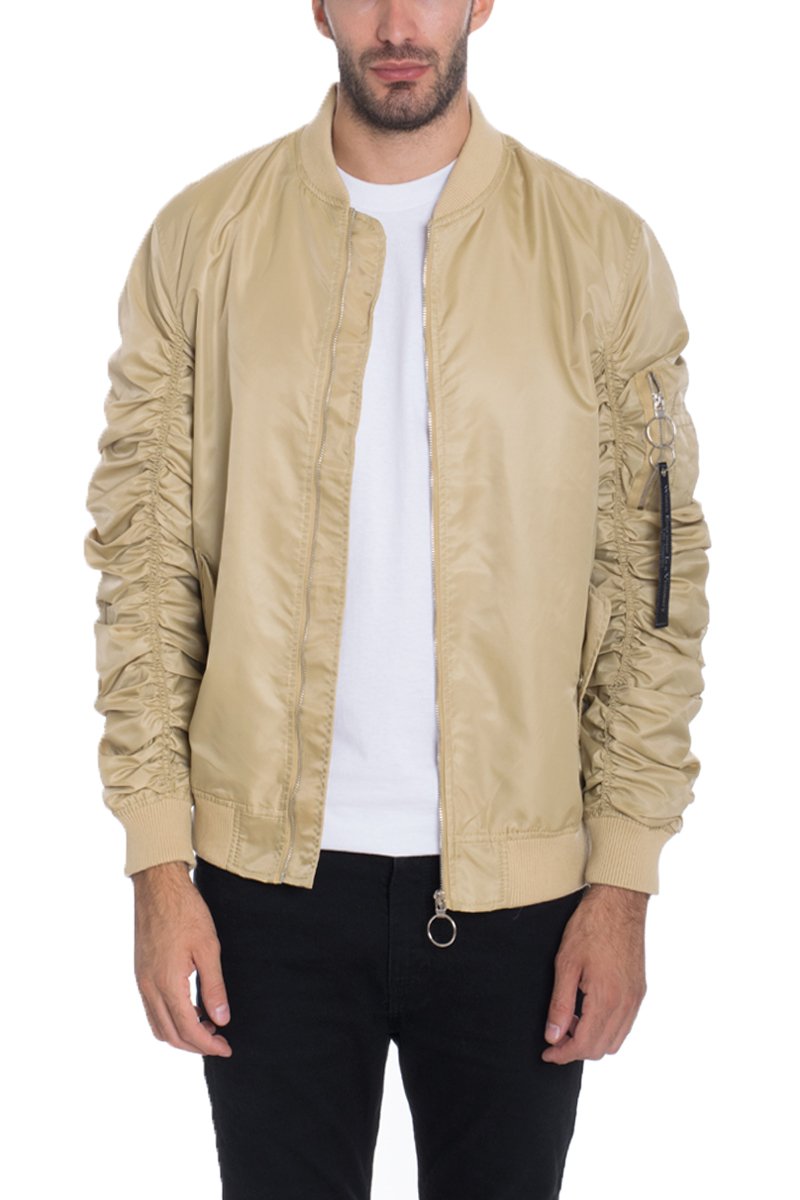 FLIGHT LINED BOMBER jacket featuring scrunched sleeves and a pocket, modeled by a person standing at 5'11 in a Medium size.