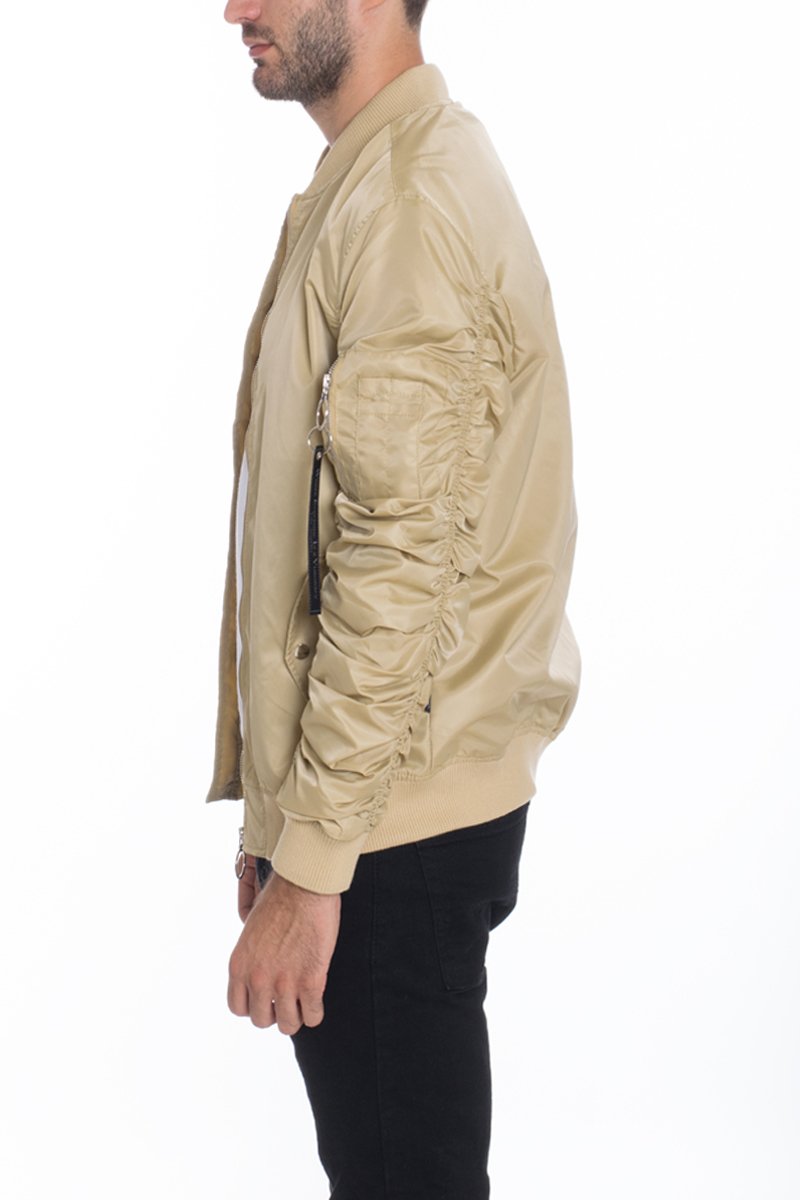 FLIGHT LINED BOMBER jacket featuring scrunched sleeves and a pocket, modeled by a person standing at 5'11 in a Medium size.