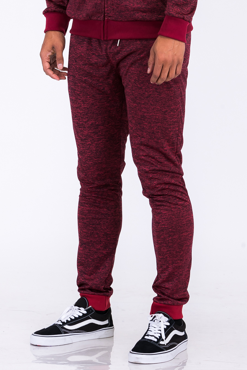 Marbled Light Weight Active Jogger featuring elastic waist, drawstring, and zippered pockets in a stylish design.