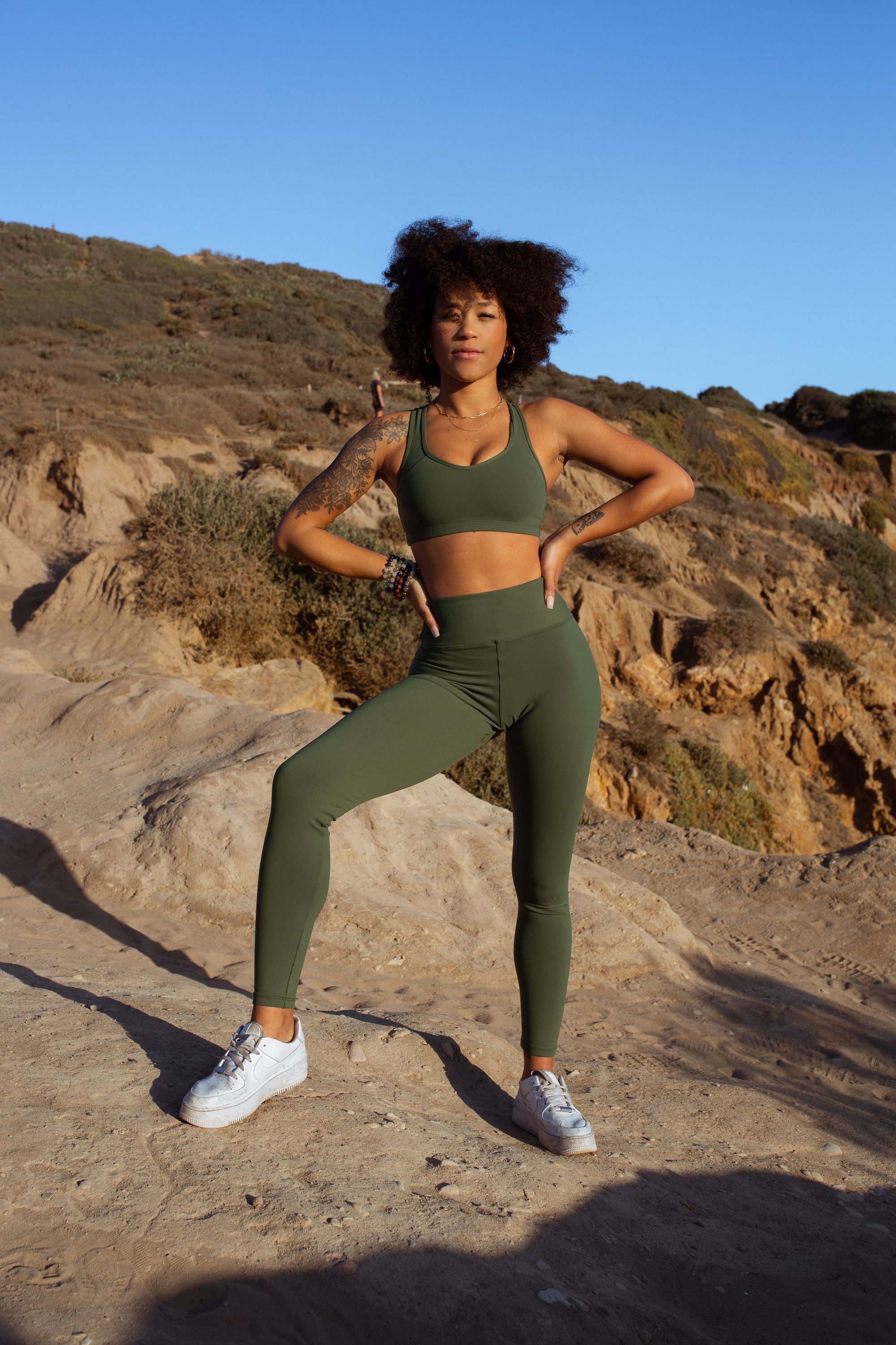 Prema Seamless High Rise Yoga Leggings in Green, showcasing a seamless design and high-rise waistband, perfect for workouts.