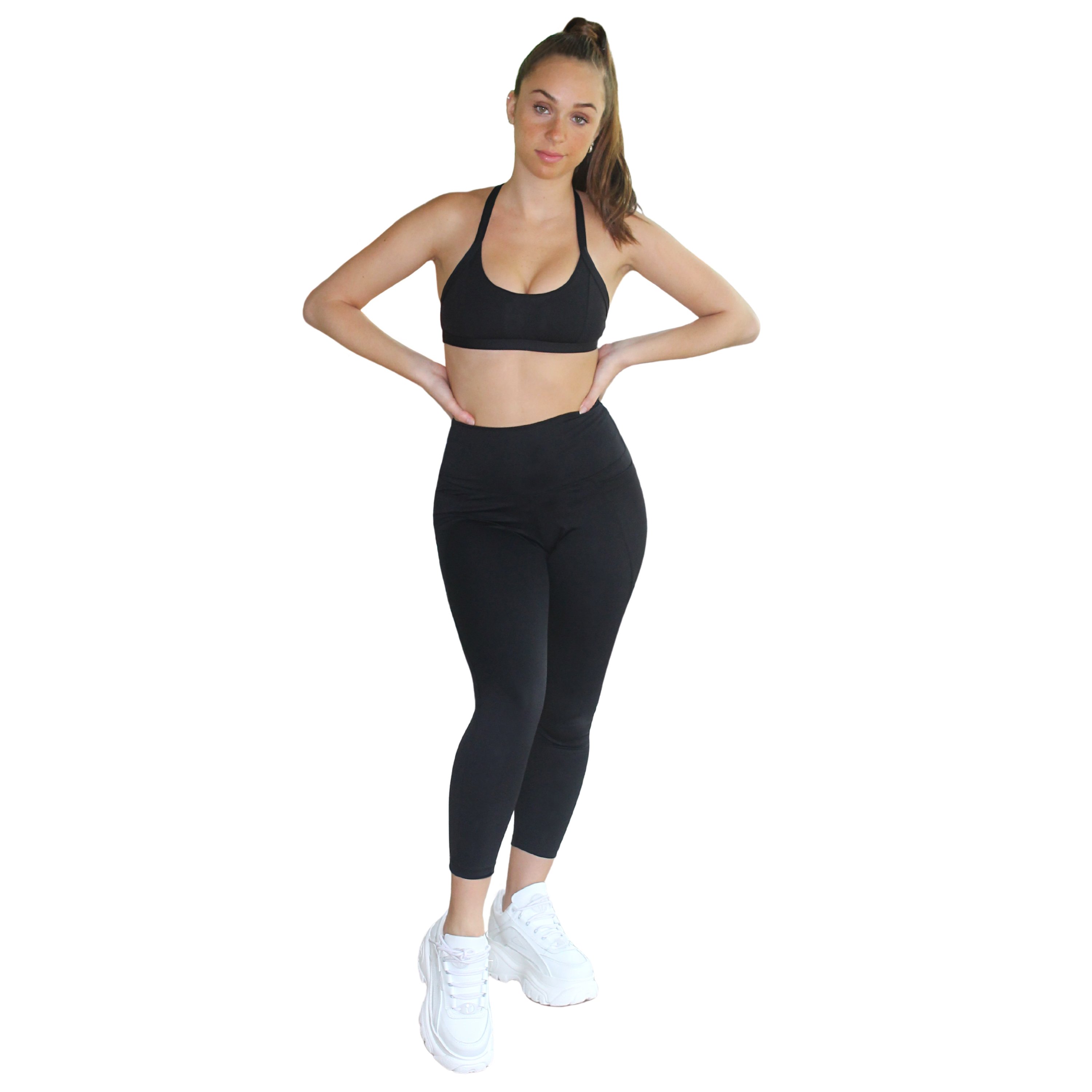 Black Satya Sports Bra with adjustable straps and open cross back design, made from eco-friendly Lycra.