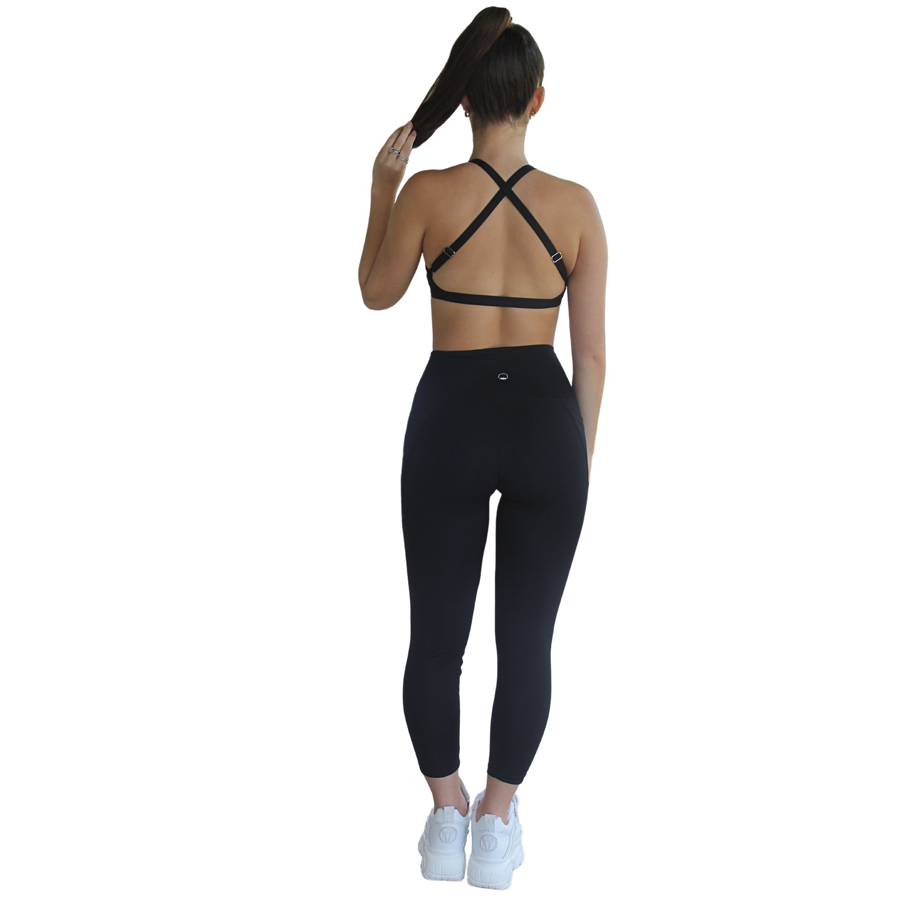 Black Satya Sports Bra with adjustable straps and open cross back design, made from eco-friendly Lycra.