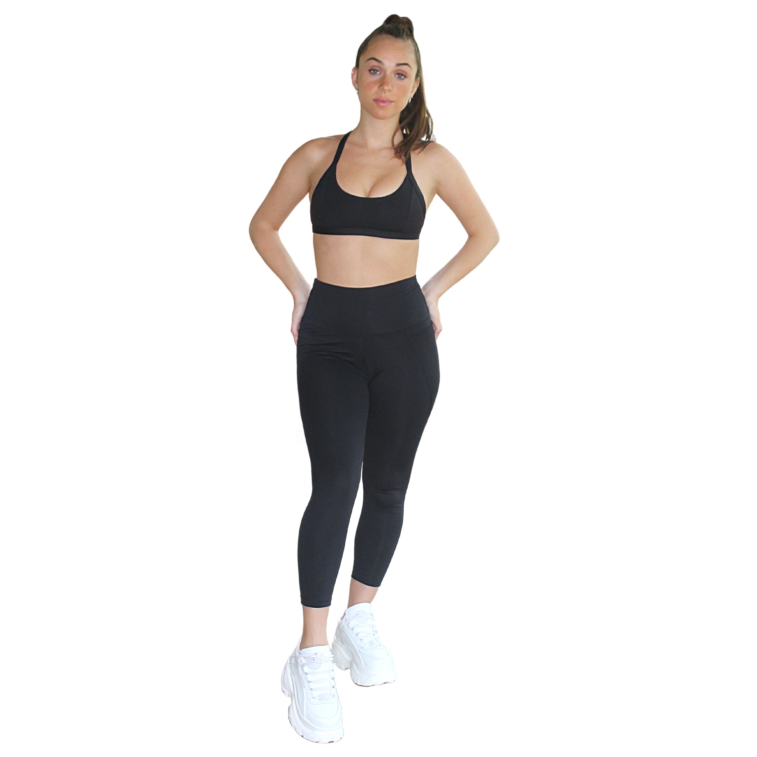 Black Satya Sports Bra with adjustable straps and open cross back design, made from eco-friendly Lycra.