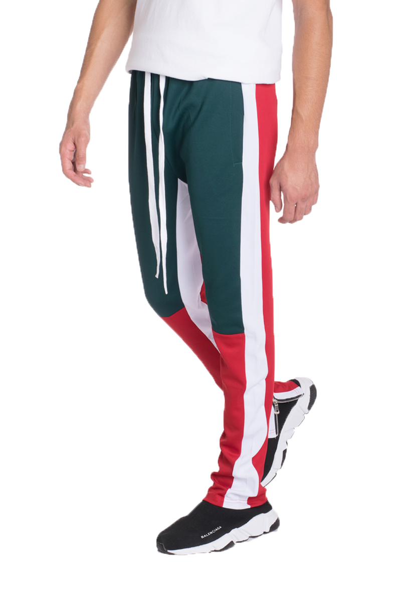 TP0555 Color Block Slim Fit Track Pants featuring a stylish design with elastic waistband, zippered pockets, and contrast colored stripes.