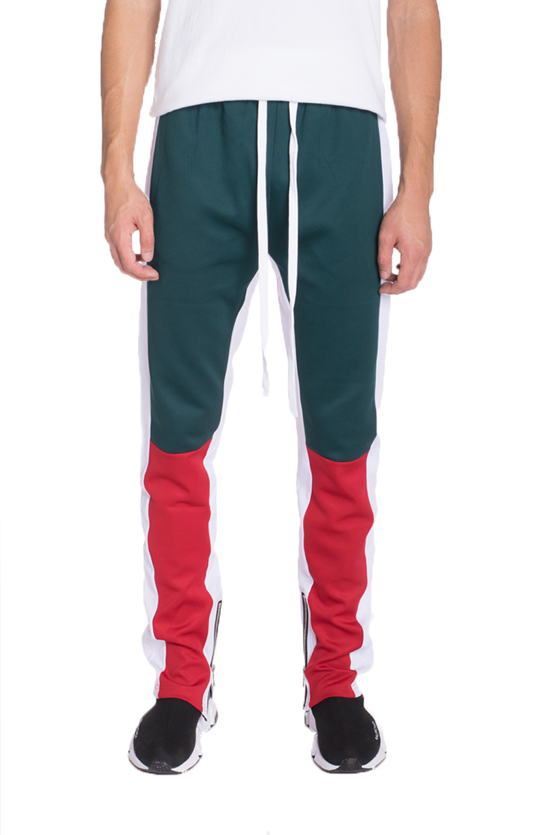 TP0555 Color Block Slim Fit Track Pants featuring a stylish design with elastic waistband, zippered pockets, and contrast colored stripes.