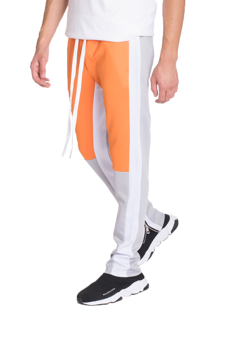 TP0555 Color Block Slim Fit Track Pants featuring a stylish design with elastic waistband and zippered pockets.