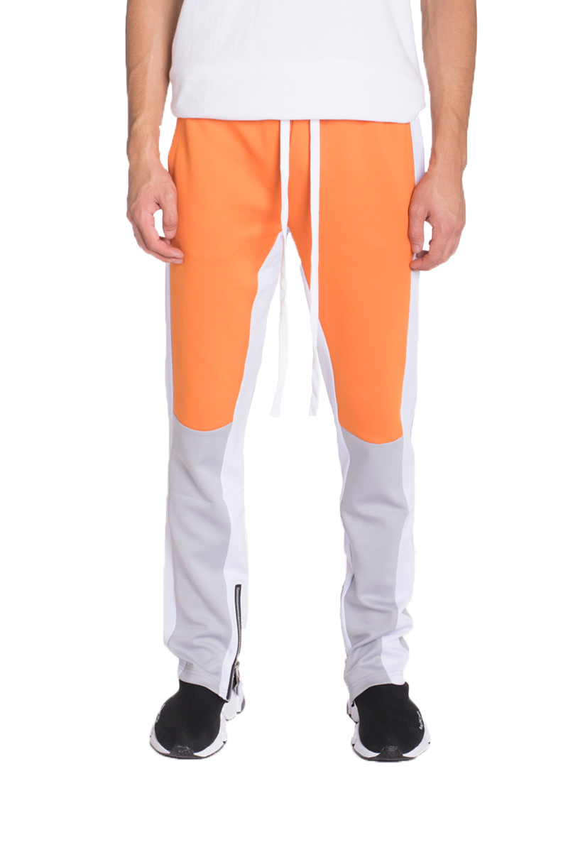 TP0555 Color Block Slim Fit Track Pants featuring a stylish design with elastic waistband and zippered pockets.