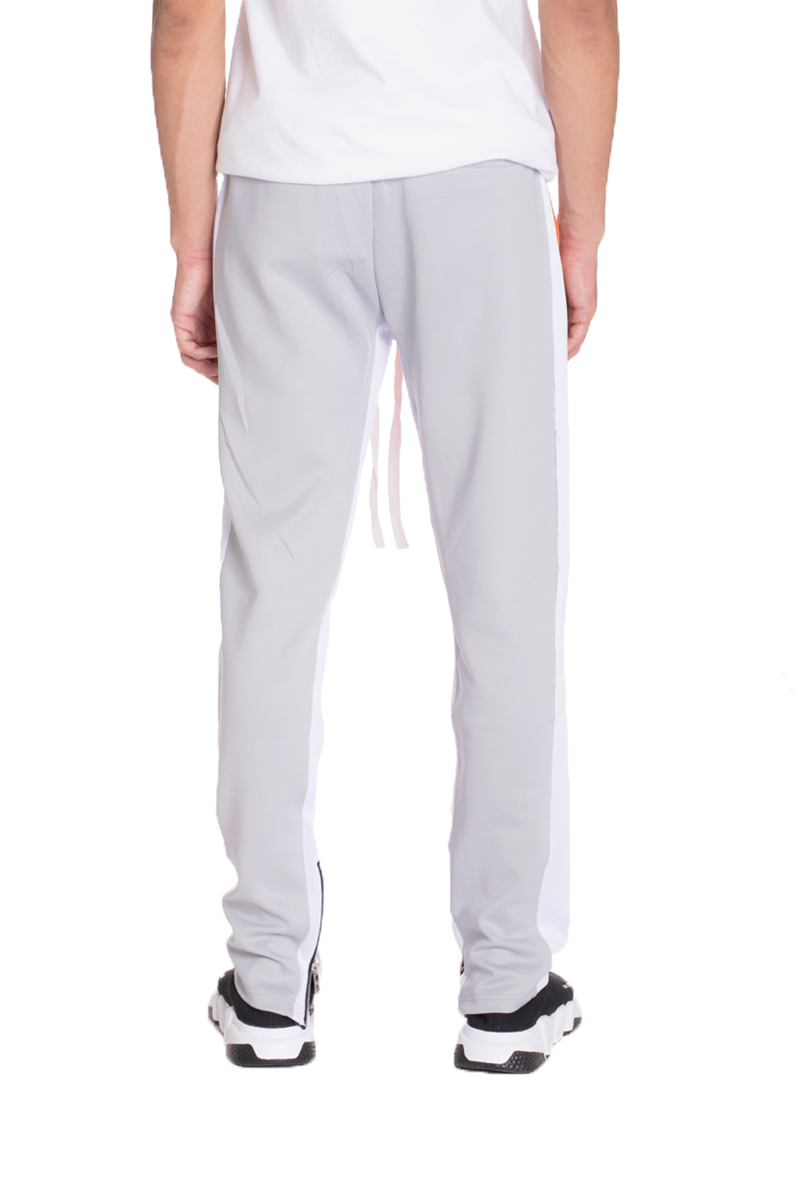 TP0555 Color Block Slim Fit Track Pants featuring a stylish design with elastic waistband and zippered pockets.