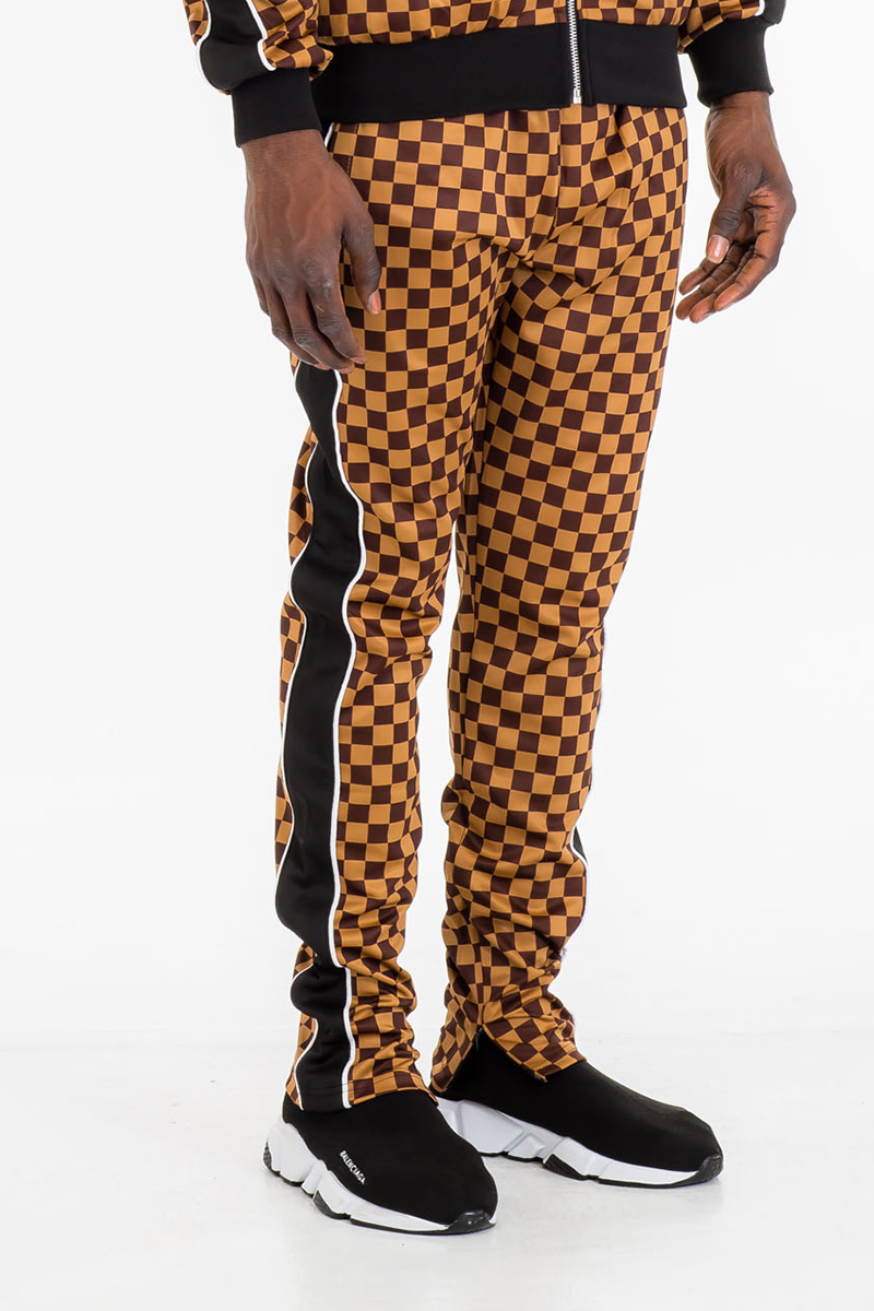 TP0512 Checkered Side Stripe Track Pants featuring a stylish checkered pattern, skinny fit, ankle zippers, and an elastic waist.