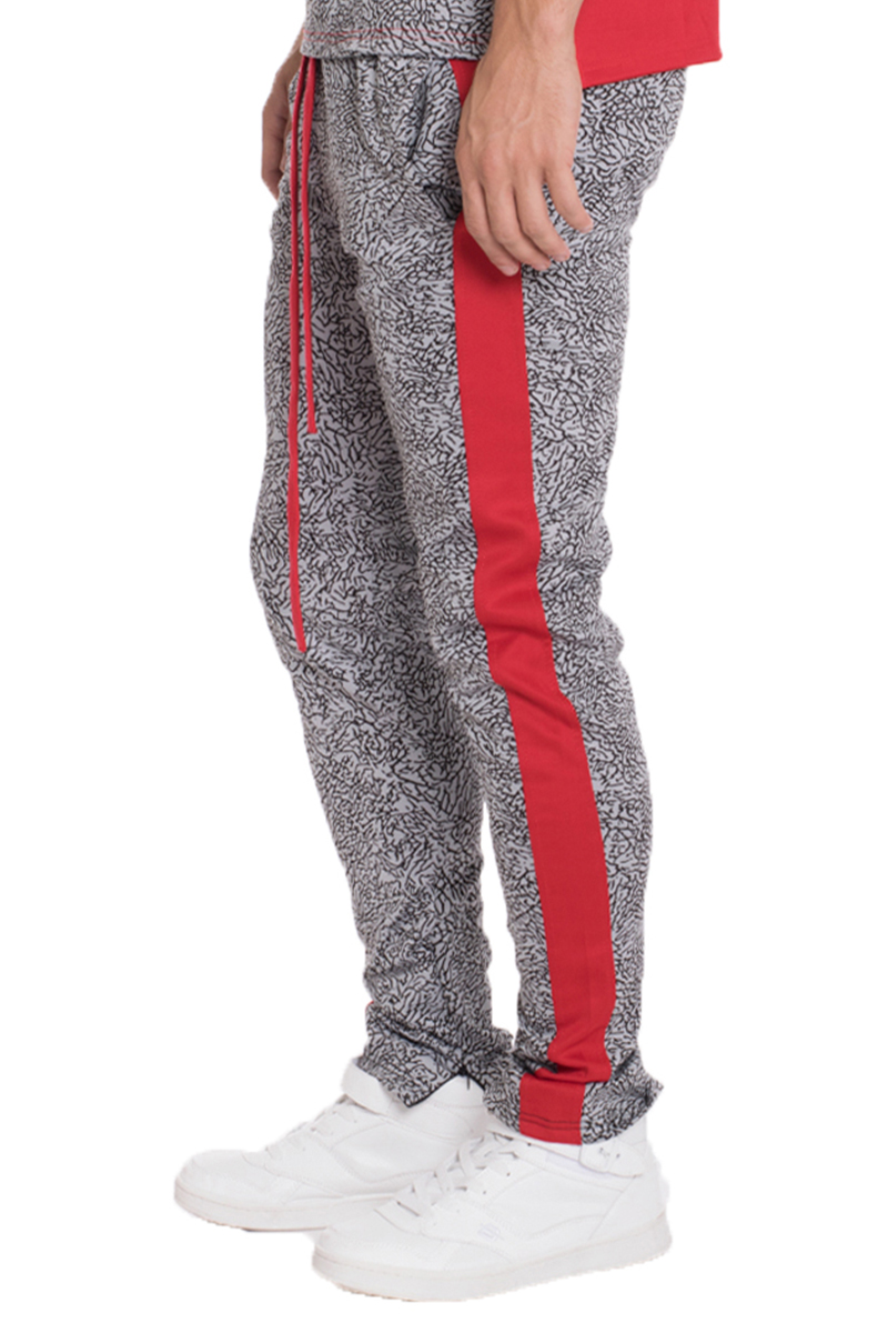 TP0561 Elephant Print Side Stripe Track Pants featuring a unique elephant design and two-tone color block with ankle zippers.