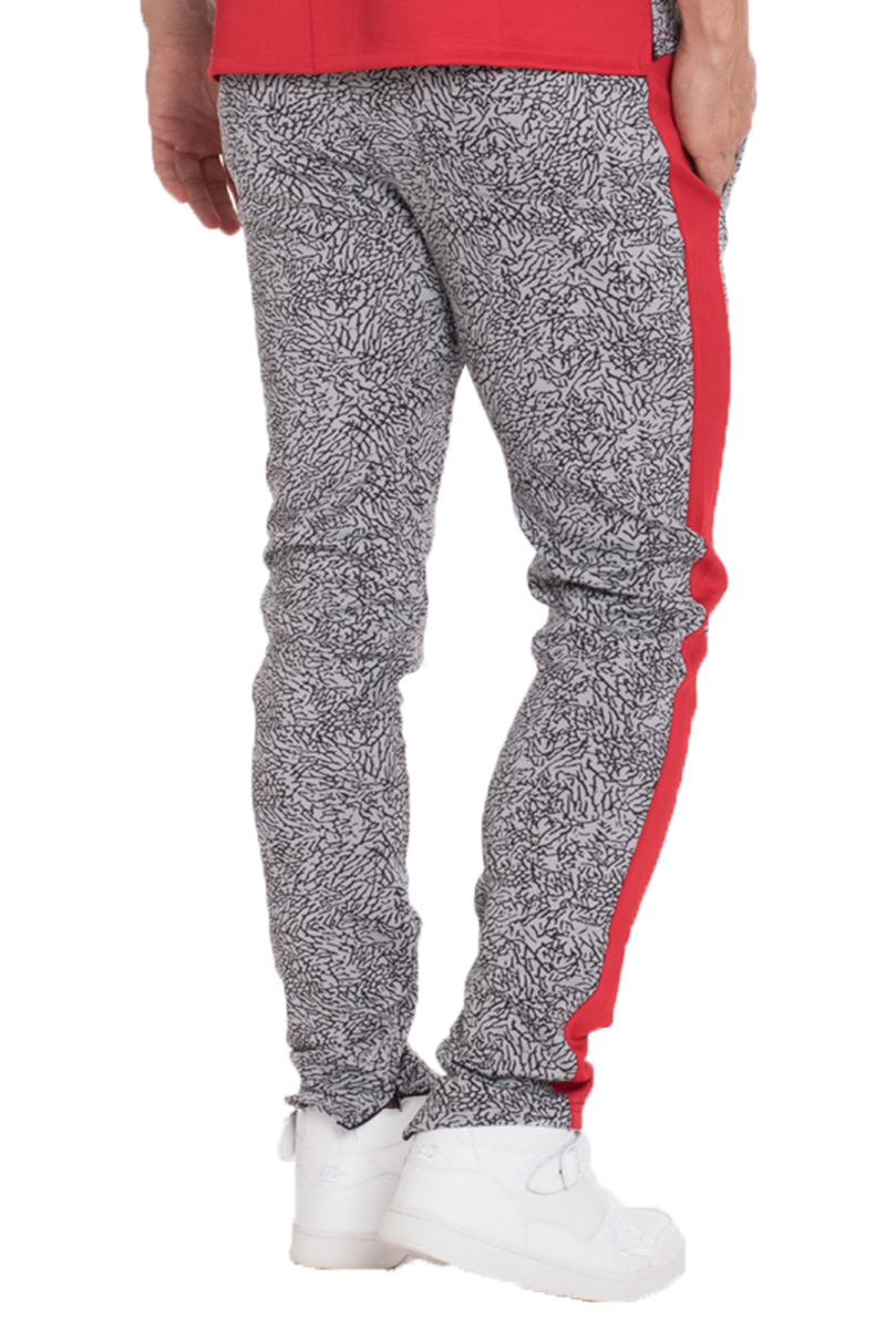 TP0561 Elephant Print Side Stripe Track Pants featuring a unique elephant design and two-tone color block with ankle zippers.