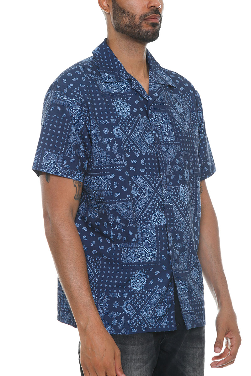 Men's paisley print button down shirt featuring a vibrant design, short sleeves, and a classic collar, made from 100% polyester.