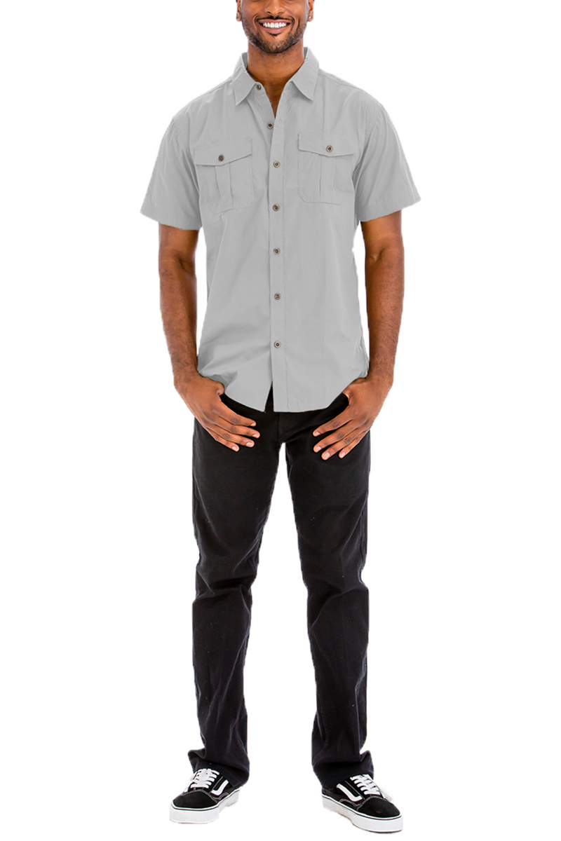 A stylish Two Pocket Button Down Shirt featuring short sleeves, button flap, and a round hem, made from a cotton-polyester blend.