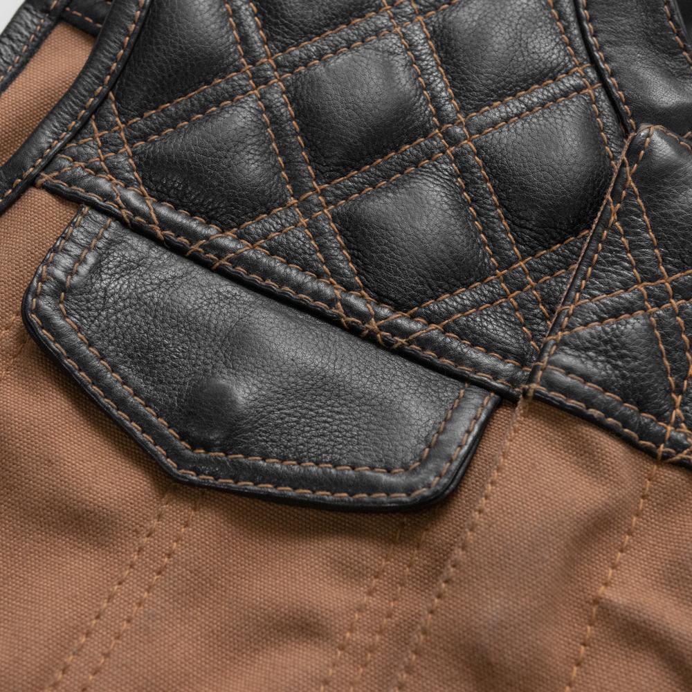 49/51 Hunt Club Limited Edition vest featuring tan stitching, durable duck canvas, and diamond quilted cowhide leather.