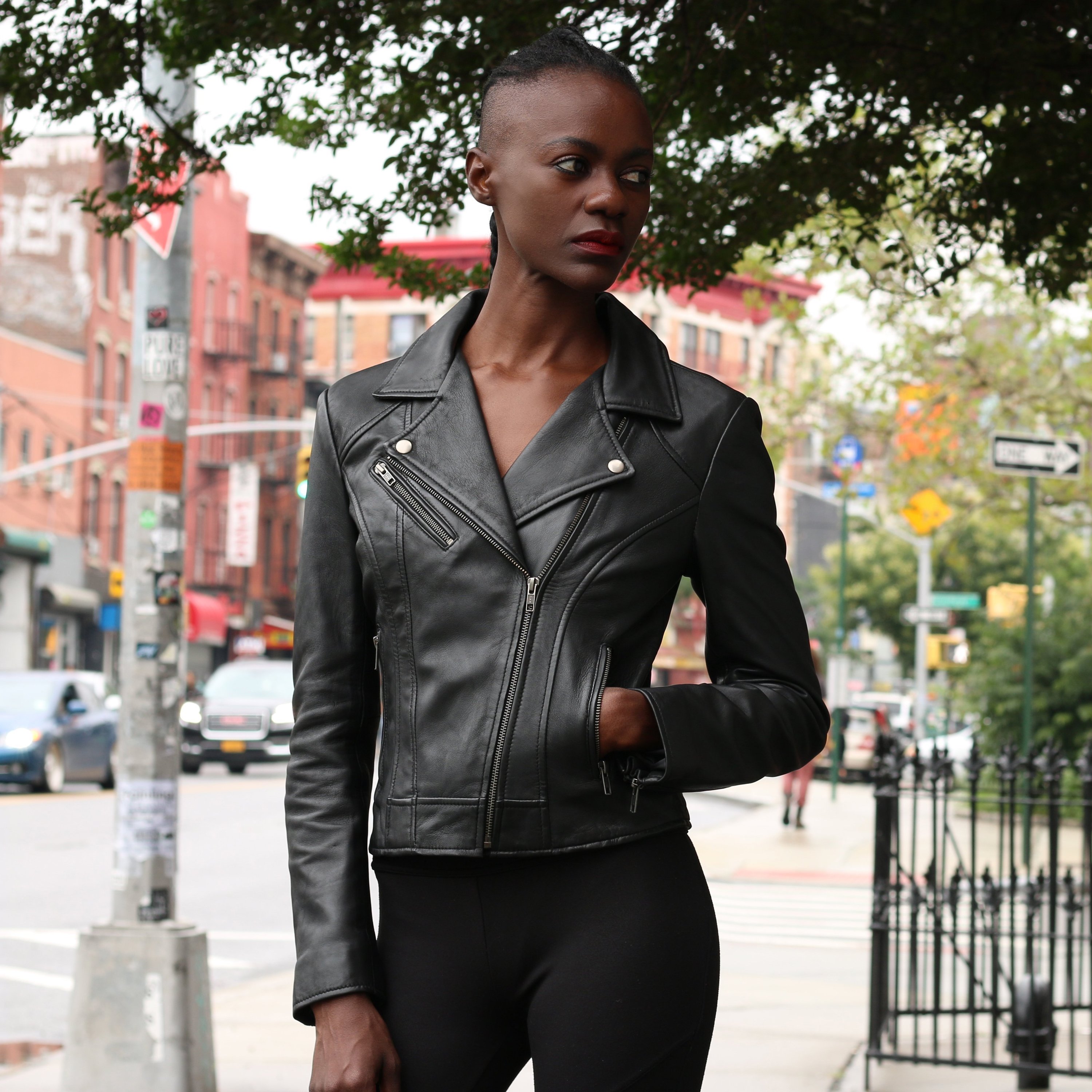 Betsy Black Rocker Jacket made from premium lambskin leather, featuring zip sleeves and multiple pockets.