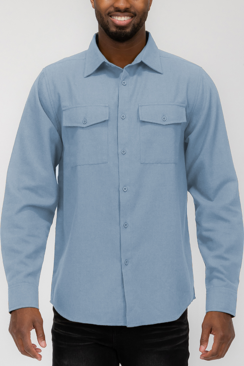 A stylish Blank Brushed Flannel shirt in solid color with dual chest pockets and button flaps, showcasing its soft fabric and regular fit.