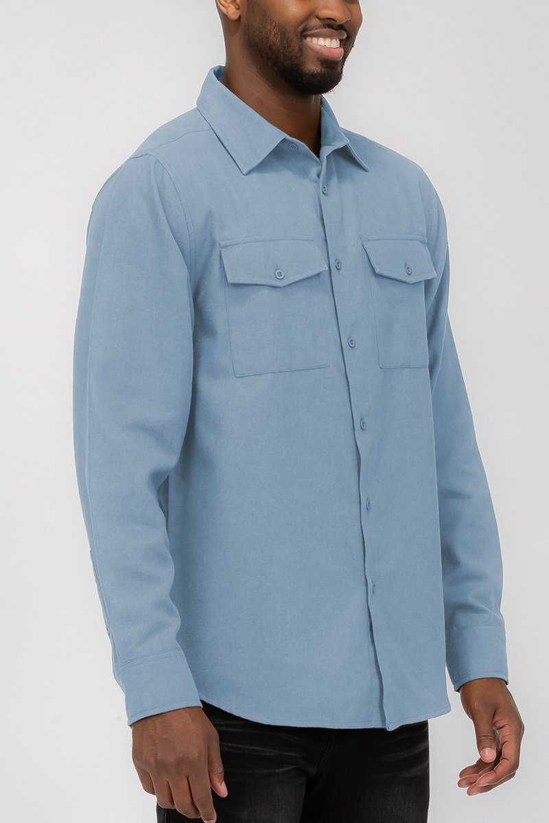 A stylish Blank Brushed Flannel shirt in solid color with dual chest pockets and button flaps, showcasing its soft fabric and regular fit.