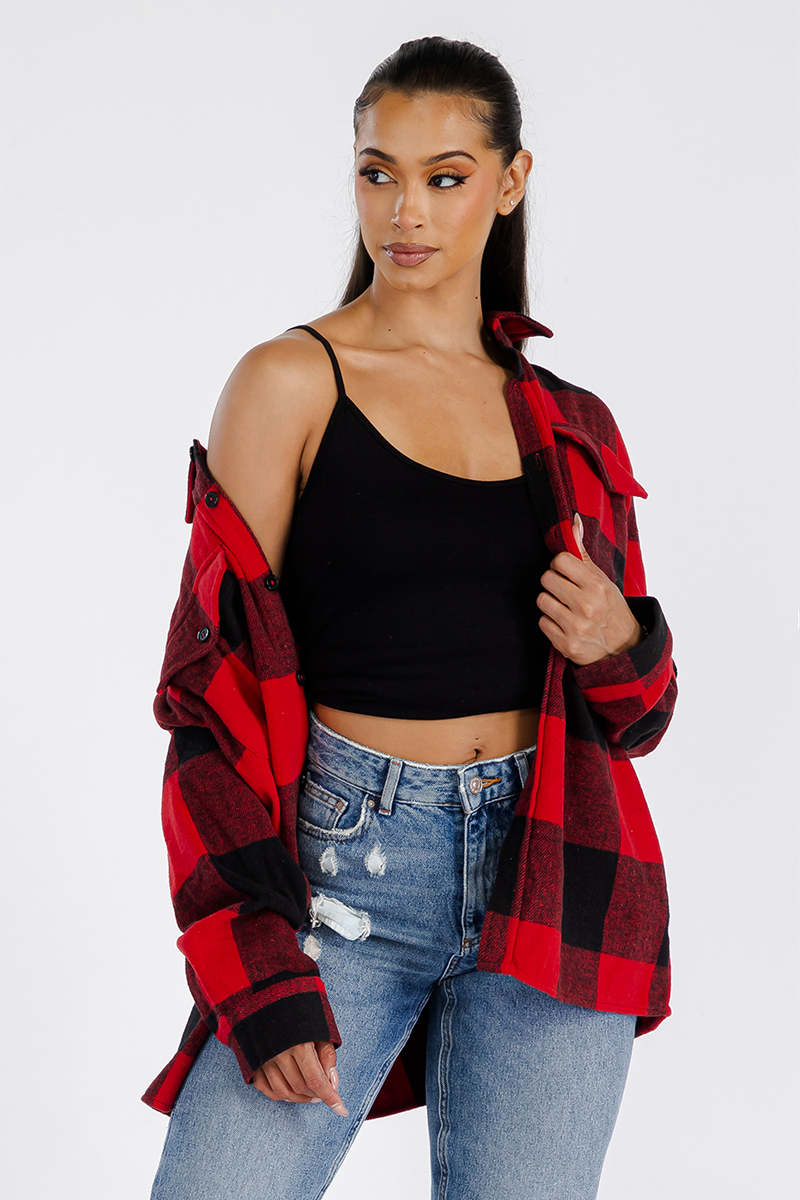 A stylish oversized flannel shacket for women, featuring a button closure and chest pockets, made from soft brushed fabric.