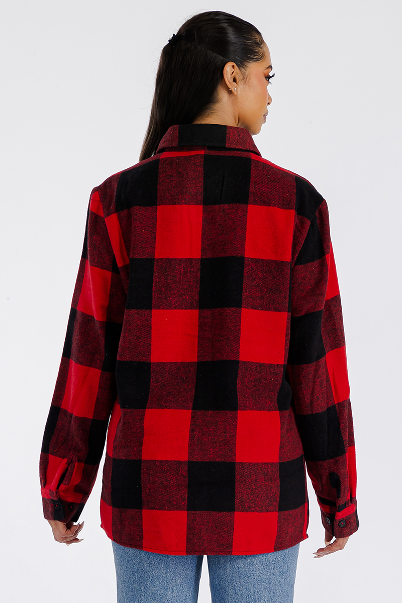 A stylish oversized flannel shacket for women, featuring a button closure and chest pockets, made from soft brushed fabric.