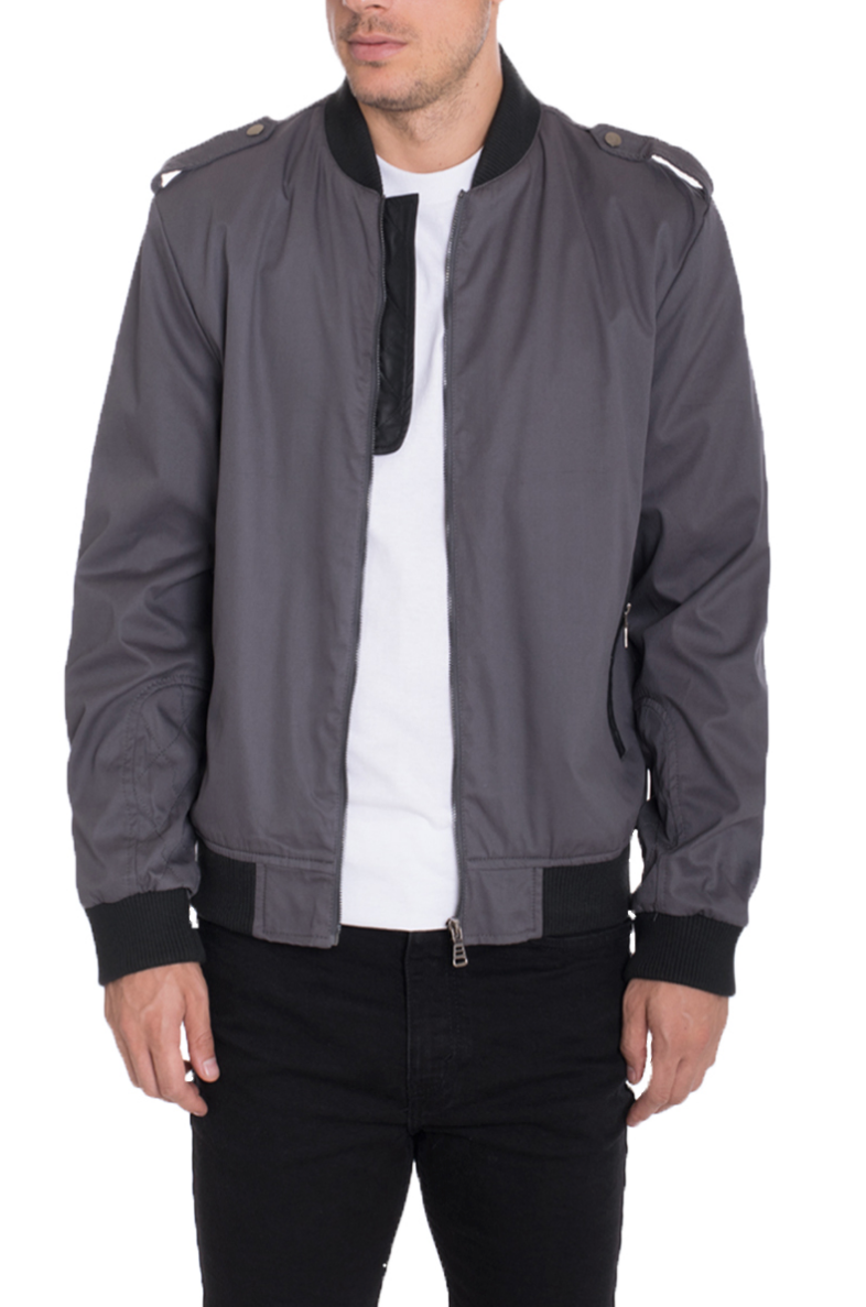 A stylish Casual Bomber Jacket made of 100% cotton, featuring contrast grey accents on the collar, waist, and cuffs, with standard pockets and shoulder strap design.