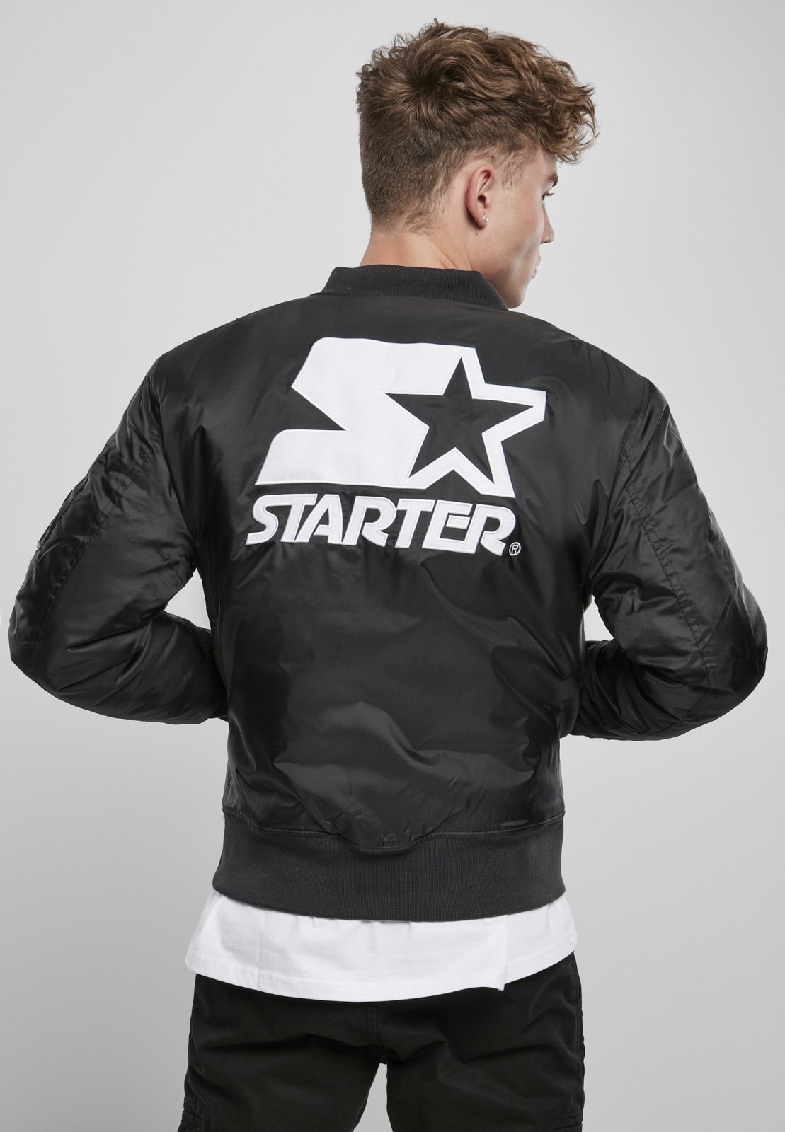 Classic Logo Bomber Jacket featuring a stand-up collar, padding, and zipper, with Starter logo branding on the chest and cuffs.