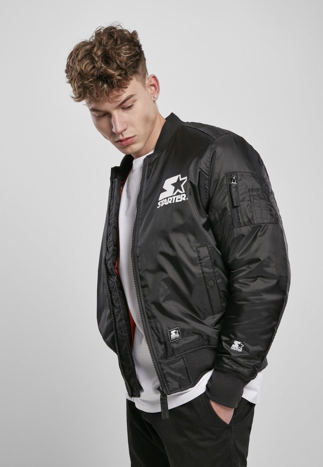 Classic Logo Bomber Jacket featuring a stand-up collar, padding, and zipper, with Starter logo branding on the chest and cuffs.